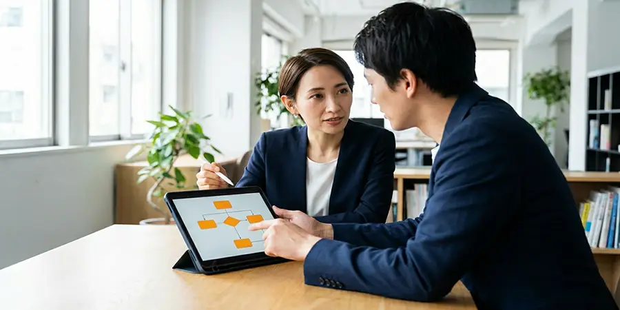 Professional instantly capturing a colleague's attention with a clear presentation