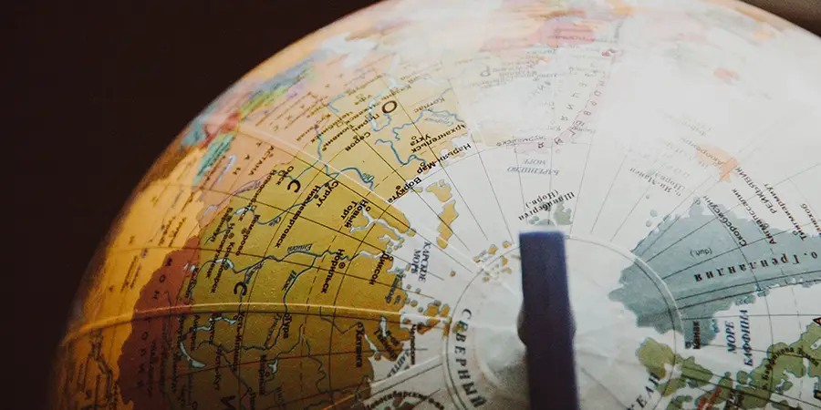 Close-up view of a globe highlighting international borders