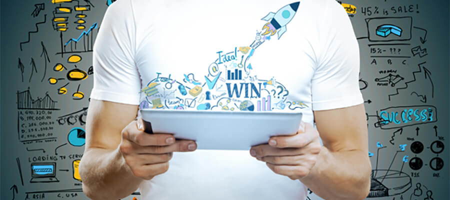 Man holding a tablet with a 'Win' tee shirt.